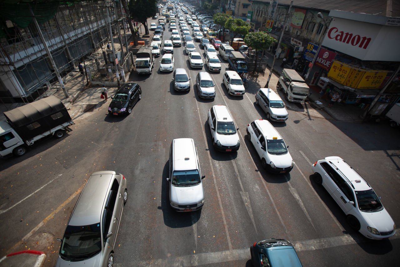 HIGH ANGLE VIEW OF TRAFFIC ON STREET