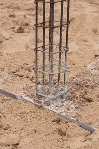 High angle view of metallic structure on beach