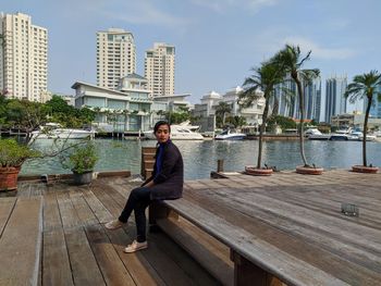 Beautiful woman with a building background