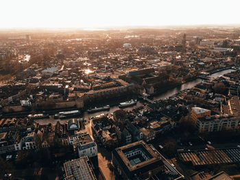 Aerial view of city against clear sky