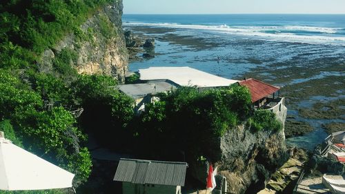 High angle view of beach by sea against sky