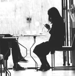 Woman sitting on bench