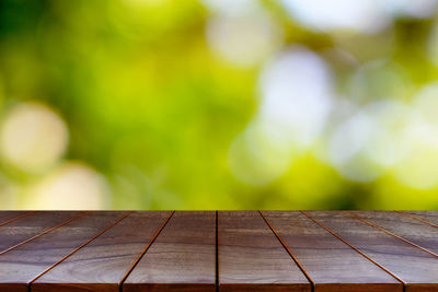 Close-up of wooden table in park