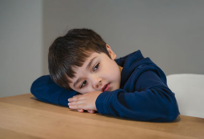 Portrait of cute boy at home