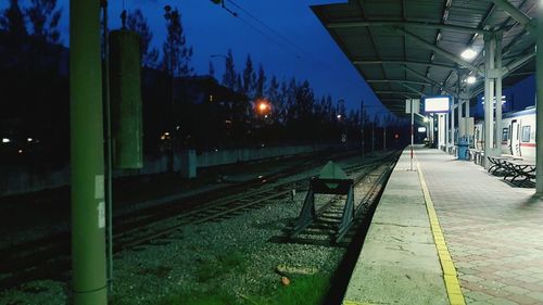 Railroad station platform at dusk