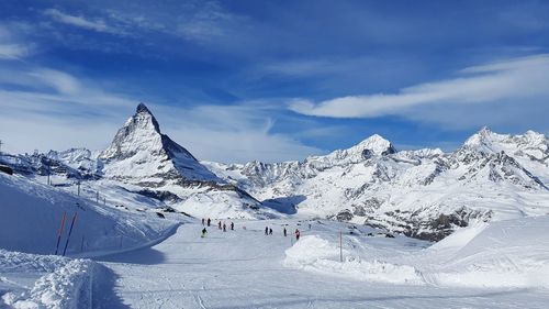 Snowcapped mountains against sky