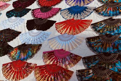 Full frame shot of multi colored umbrellas hanging at market stall