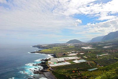 Scenic view of sea against cloudy sky