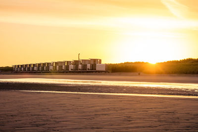 Scenic view of sea against sky at sunset