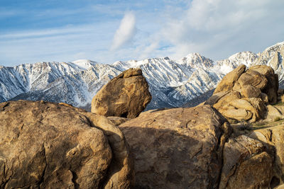 Scenic view of snowcapped mountains against sky