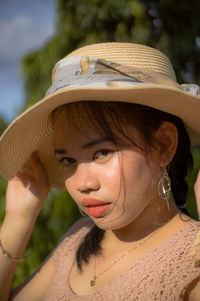 Portrait of young woman looking away