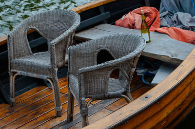 Empty chairs in abandoned boat