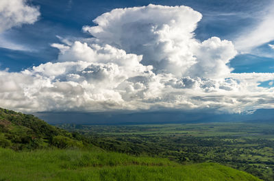 Scenic view of land against sky