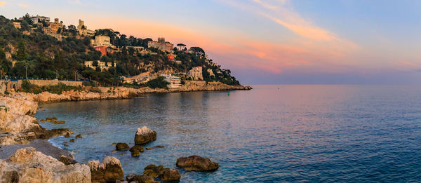 Scenic view of sea against sky during sunset