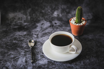 Coffee cup on table