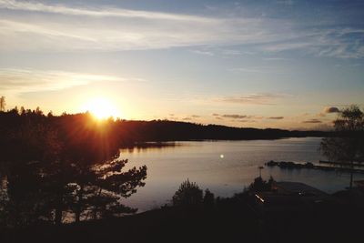 Scenic view of sunset over river