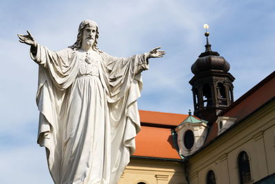 Low angle view of statue against sky