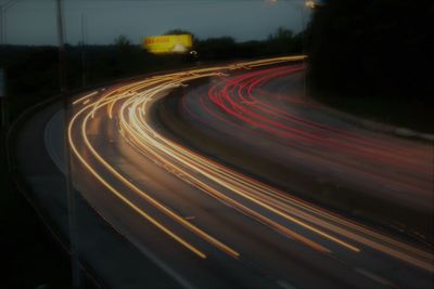 Light trails on road at night