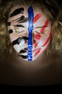 High angle view of woman with painted face