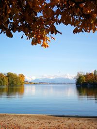 Scenic view of lake against sky during autumn
