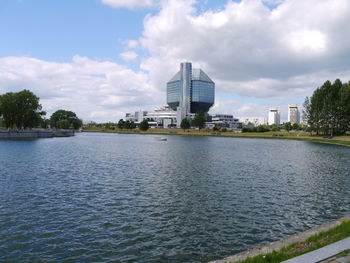 View of city against cloudy sky