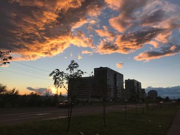 Buildings against sky during sunset