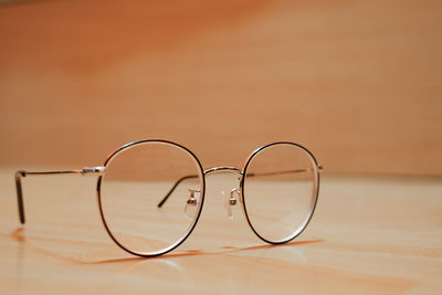 Close-up of eyeglasses on table