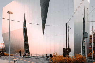 Panoramic view of buildings against sky at sunset
