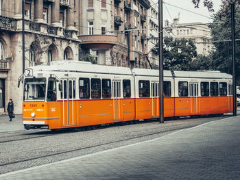 Train on street in city