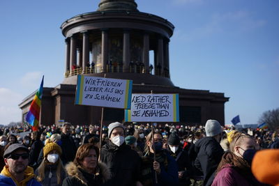 German anti war demonstrators  in berlin, with placards against russian oil and gas