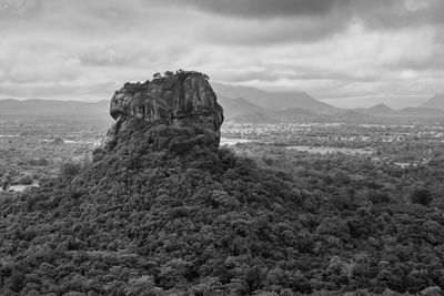 Scenic view of land against sky