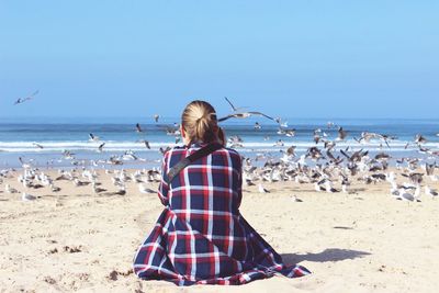 Scenic view of beach against clear sky