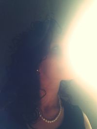 Woman in dark room