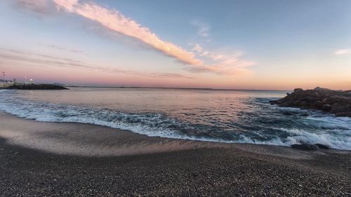 Scenic view of sea against sky during sunset