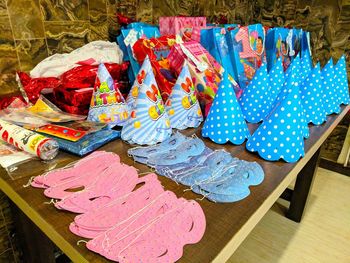 High angle view of multi colored umbrellas on table