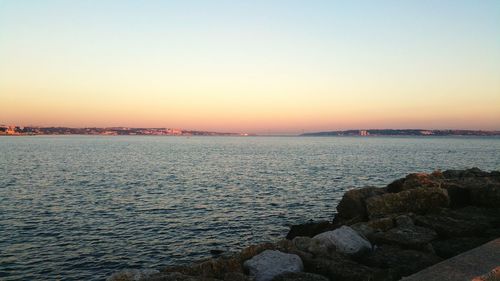 Scenic view of sea at sunset