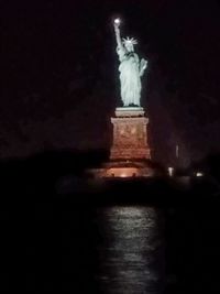 Statue of fountain at night