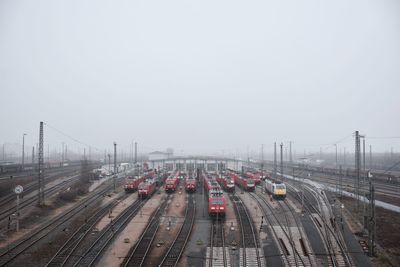 High angle view of cars on road against clear sky