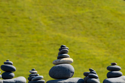 Stack of stones on field