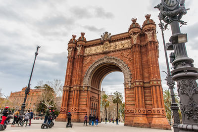 Group of people in front of historical building