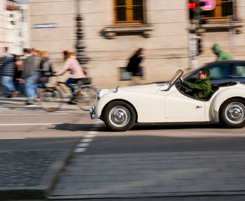 Close-up of car in city