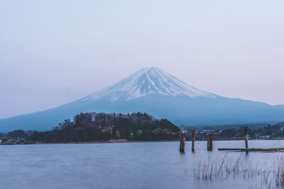 Scenic view of snowcapped mountain against sky