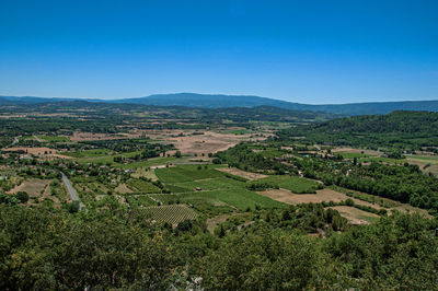 Panoramic view of the fields and hills of provence near gordes, in the french provence.