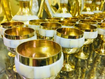 Close-up of wine glasses on table