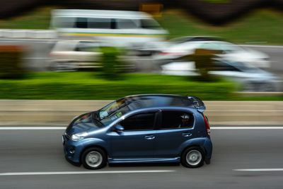 Cars on road in city