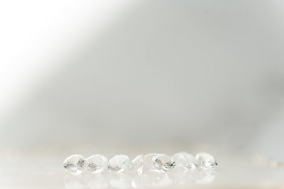 Close-up of bubbles against white background