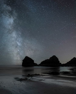 Scenic view of sea against sky at night