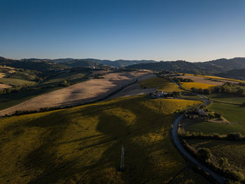 High angle view of land against clear sky