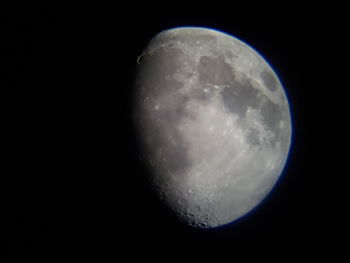 Low angle view of moon in sky at night