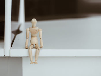 Close-up of figurine on table